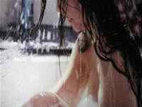 Banned picture showing partial view of breast in bath